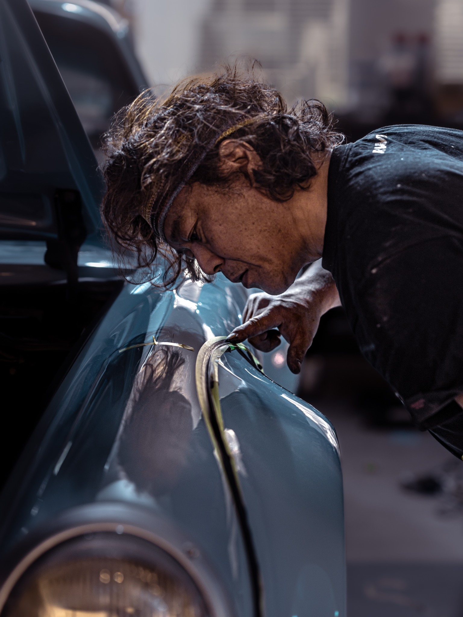 A moment spent checking the body and fender details.