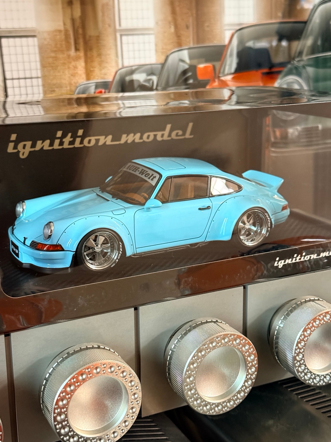 Light-blue HANGANG 1/18 model in its display case